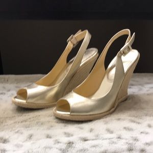 Gold leather and rope espadrille wedge .